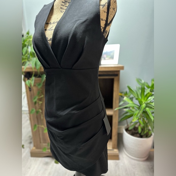 Lulu’s Cocktail hour black sleeves tulip mini dress. Size M. New with tags. - Picture 4 of 7